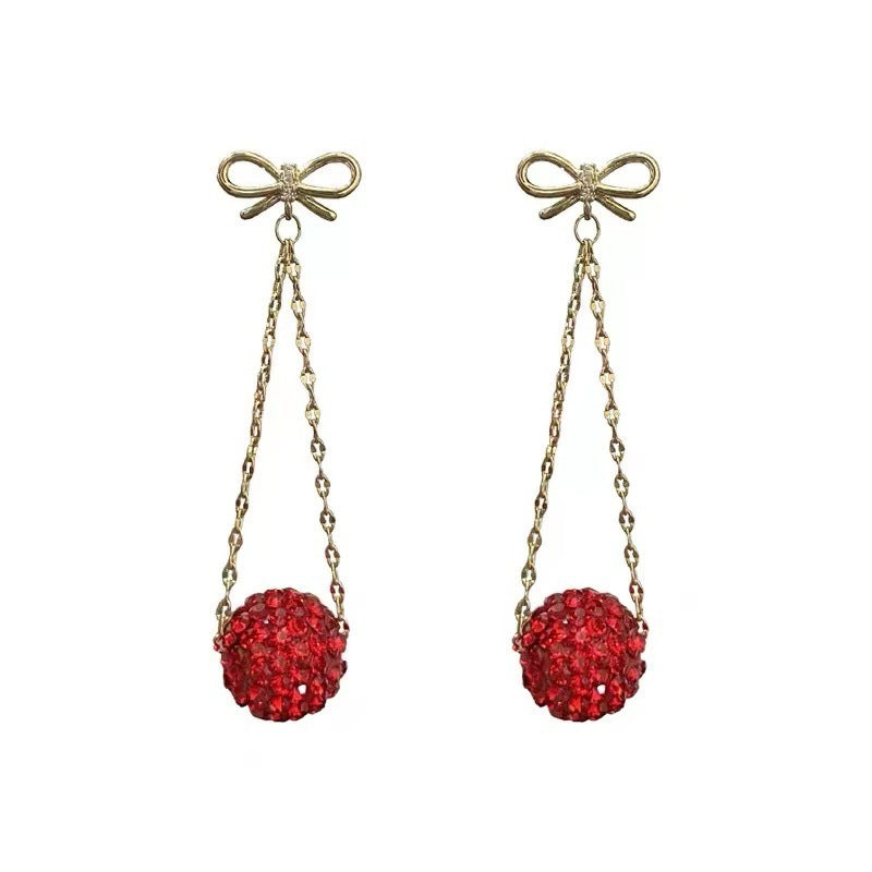 Gold Bow Drop Earrings with Red Stones