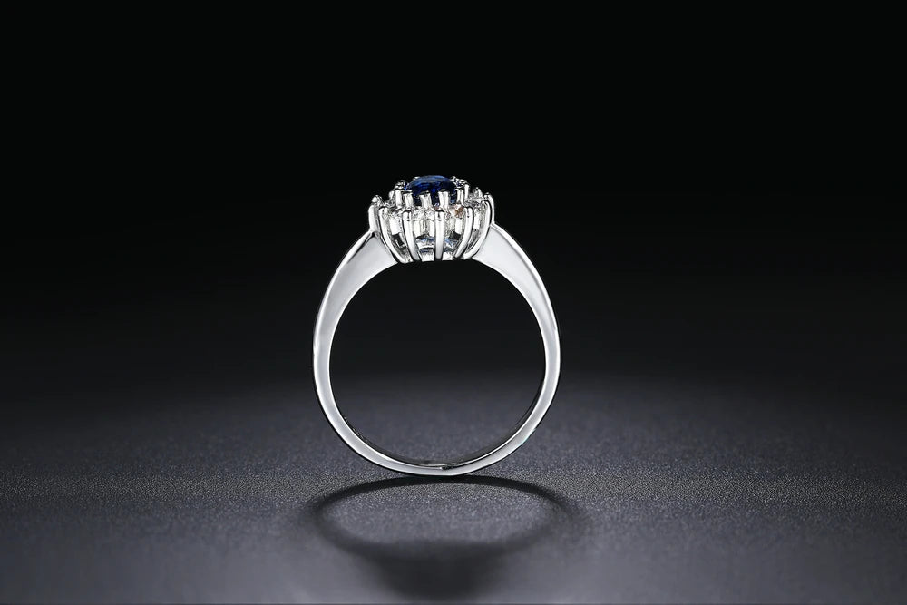 Eleganter silberner Ehering mit blauem Kristall - GulnarStar