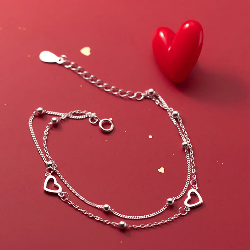 Romantic Sterling Silver Bracelet with Heart and Bead Charms