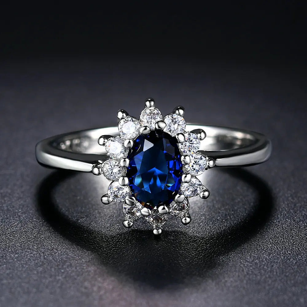 Eleganter silberner Ehering mit blauem Kristall - GulnarStar