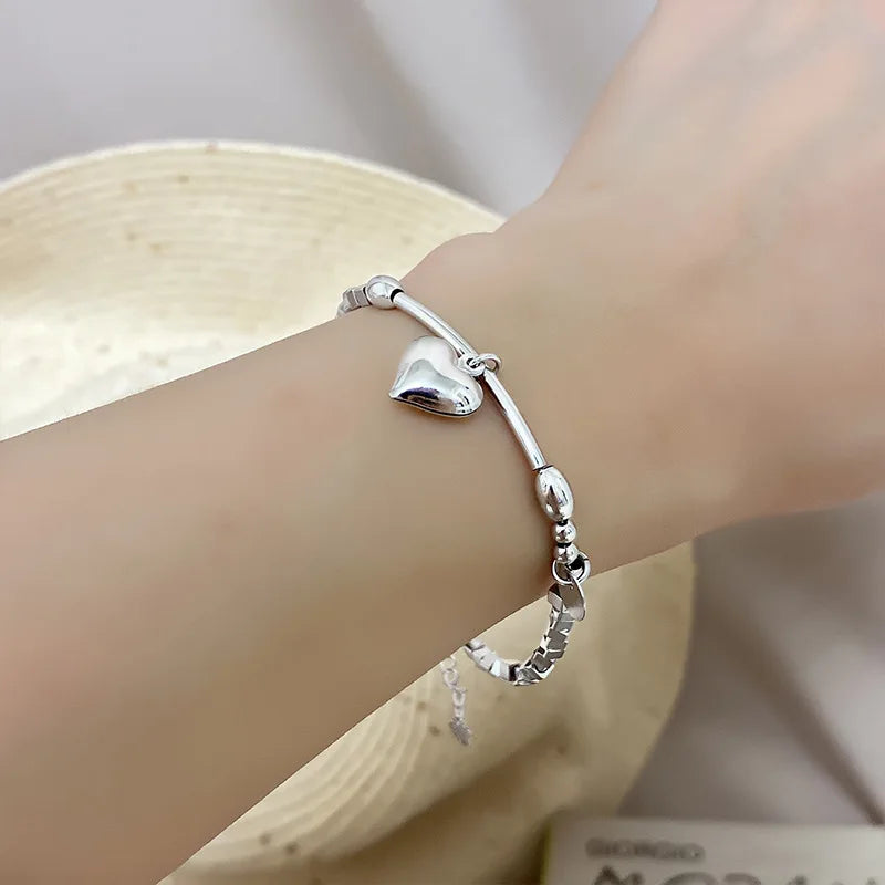 Romantic Sterling Silver Bracelet with Heart and Bead Charms