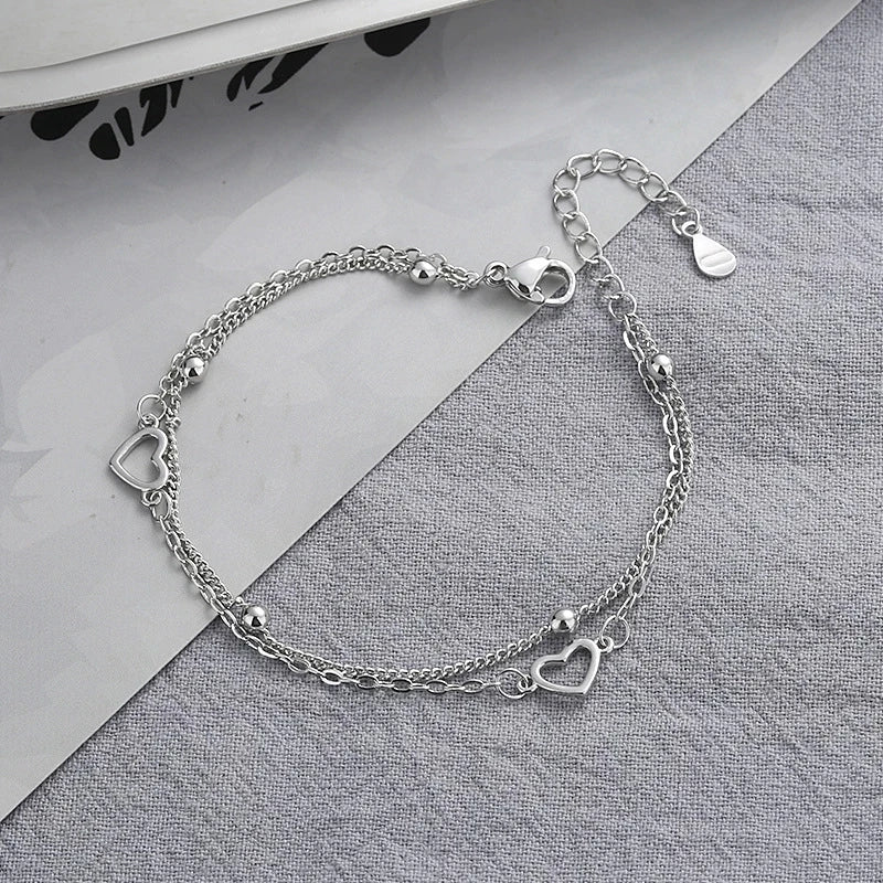 Romantic Sterling Silver Bracelet with Heart and Bead Charms